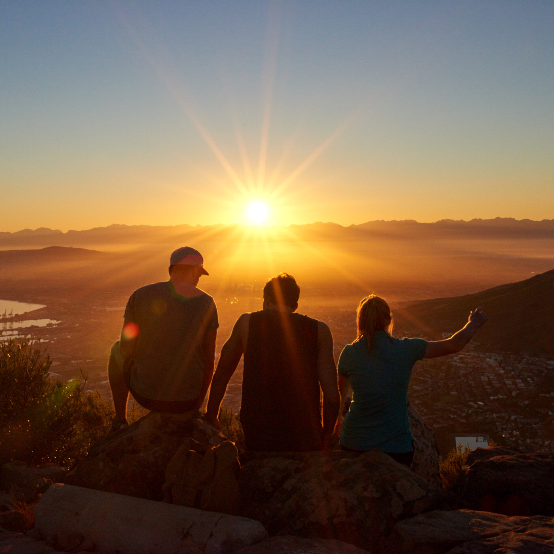 Silhouettes of friends watching a sunrise together in nature FAMILY DYNAMICS ASSESSMENT